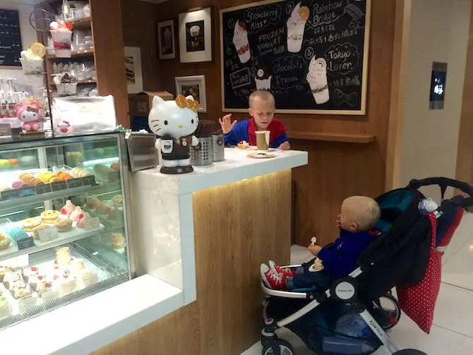 hello kitty cafe hong kong counter with jack in stroller pic
