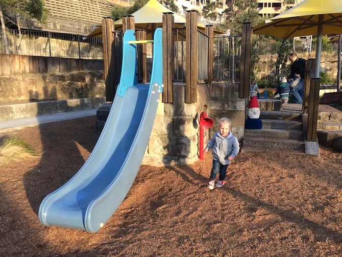 pirrama park playground with jack on slide pic