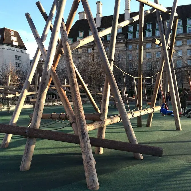 Jubilee gardens playground near London Eye - balance beam in afternoon sun