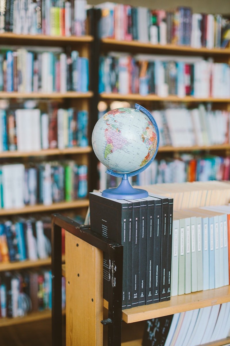 photo-of-globe-on-top-of-books-3747542