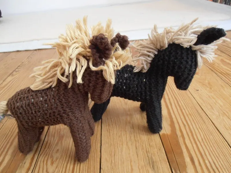 two waldorf toys horses by storebukkebruse