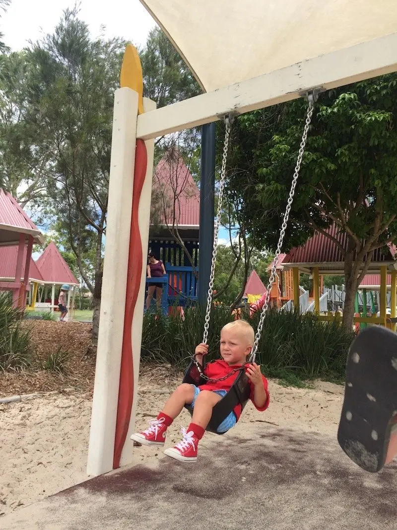 photo - hidden world playground swings