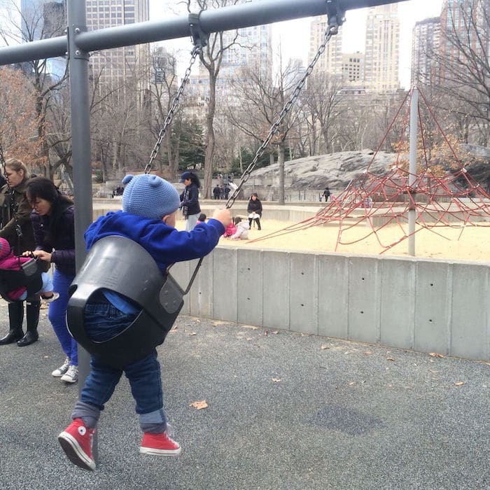 Visit ROAM THE GNOME Family Travel Website Directory for SUPER DOOPER FUN ideas for family vacations around the world. Search by city. Photo- Heckscher Playground Central Park swings