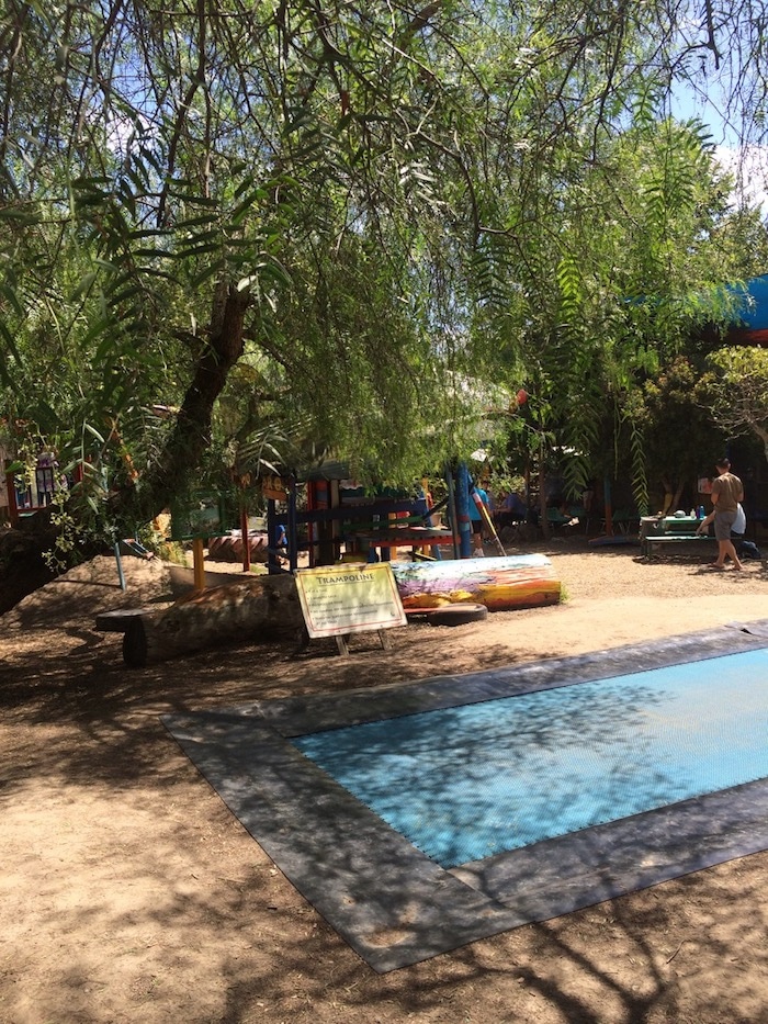 in ground trampoline at st kilda adventure playground in melbourne pic