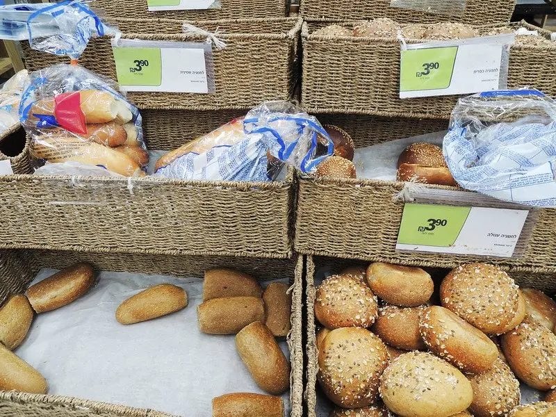 bread rolls at the supermarket by piotr rokita 