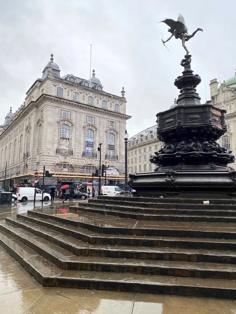 image - picadilly circus statue in the rain