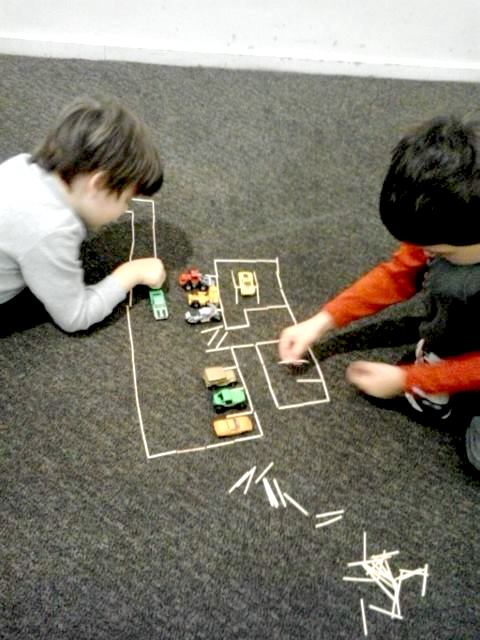 katrina boys matchstick cars in airport travel hack1