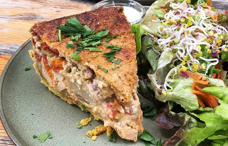 healthy road trip food quiche with salad by christoph scholz