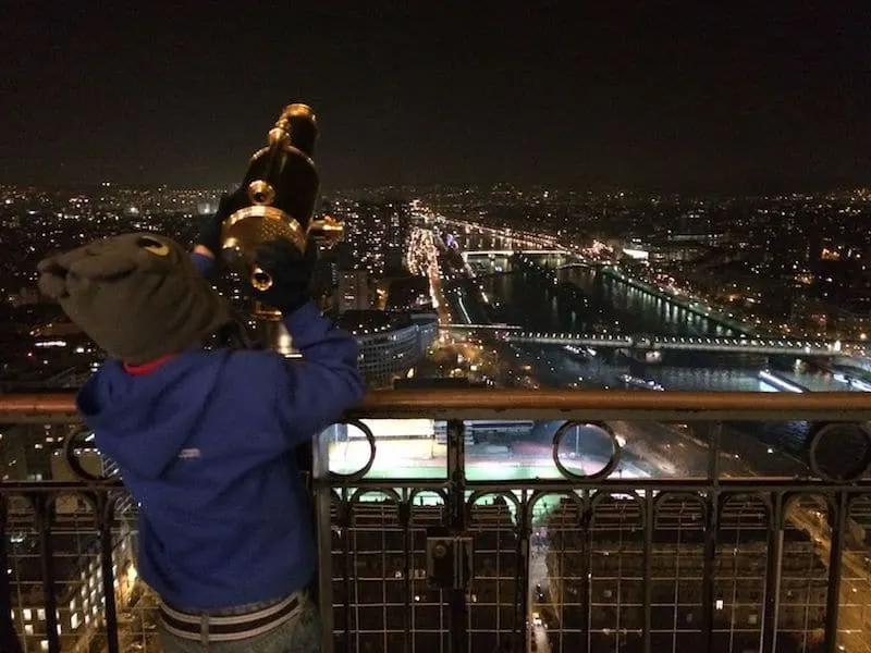 eiffel tower with kids at night pic