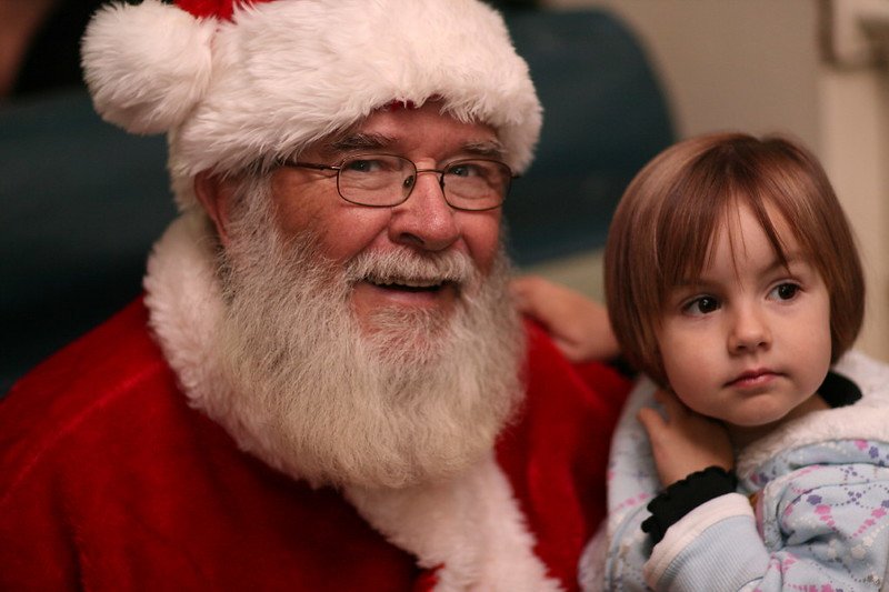 santa with child on polar express by joe osterloh