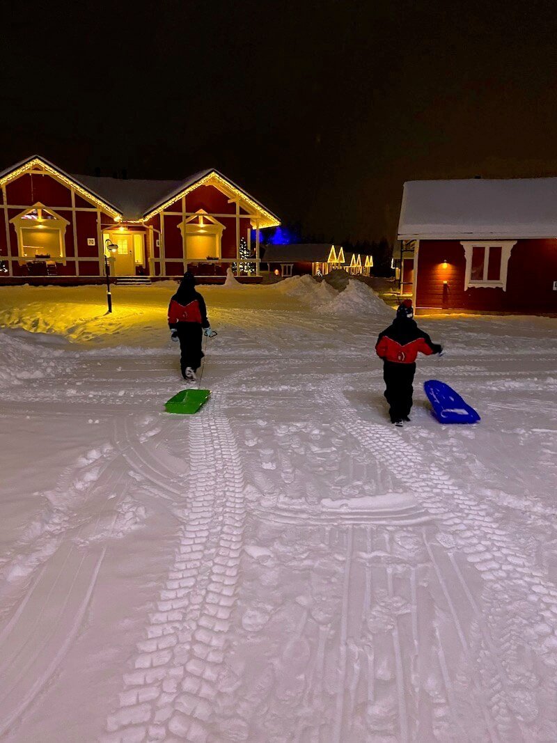 image - santa claus holiday village sleds