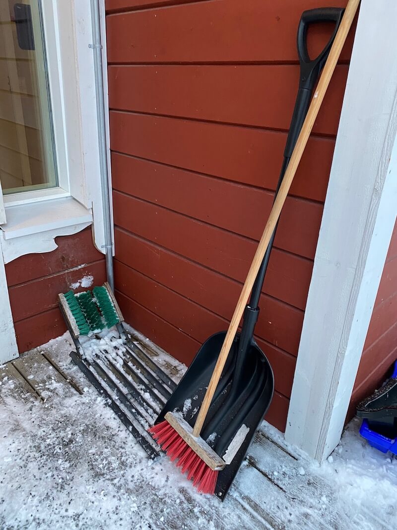image - santa claus holiday village snow dustpan and broom
