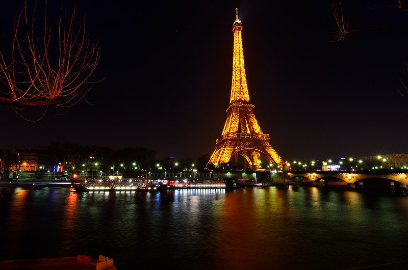 eiffel tower at night by javier vieras