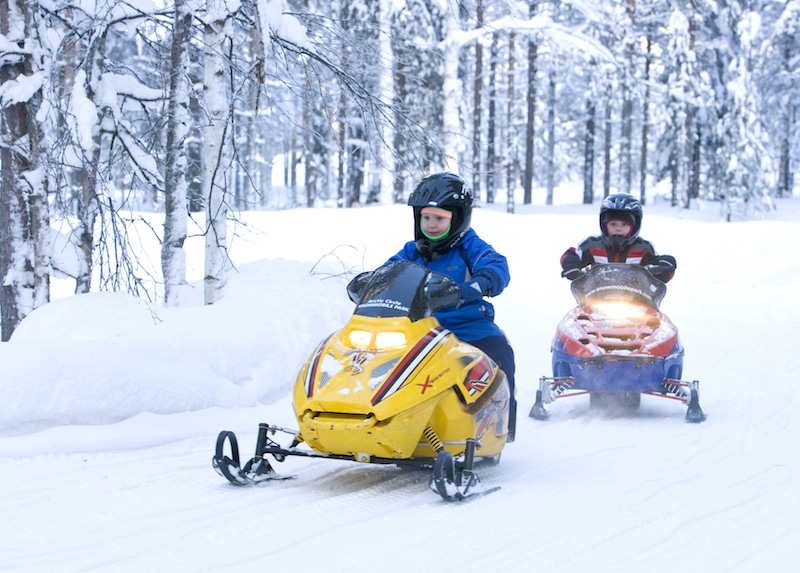 best things to do in rovaniemi in winter - snowmobile by visit rovaniemi