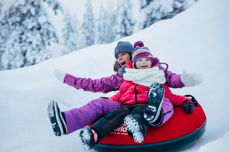 snowtubing at snowman world image by visit rovaniemi