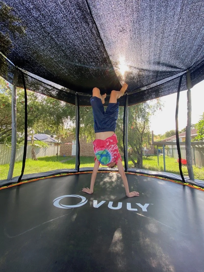 best tricks on a trampoline pic - handstand