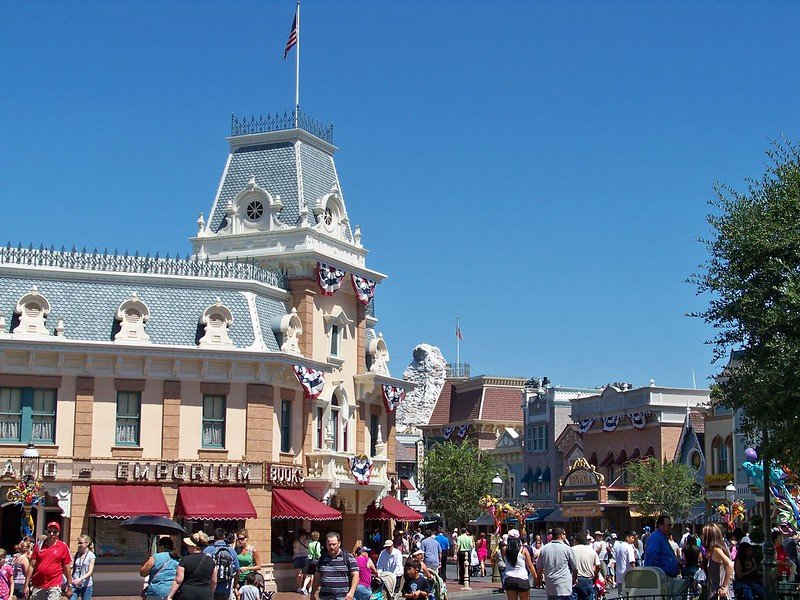 pin trading at the disneyland emporium by loren javier