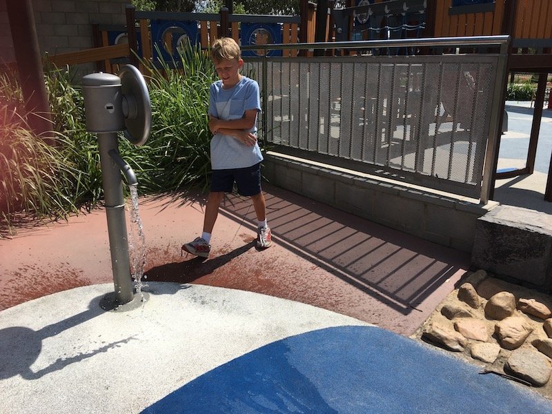 boundless playground water pump play pic