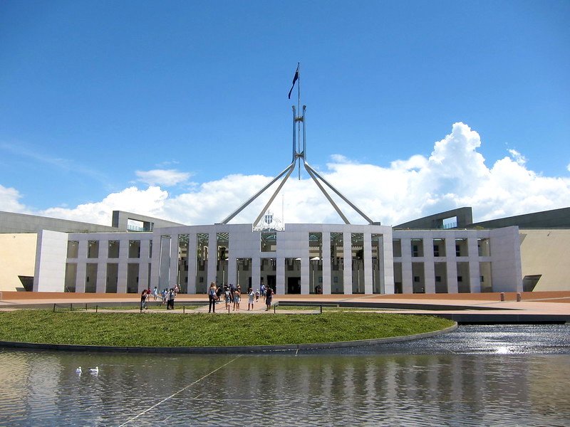 parliament house canberra with flag by mike