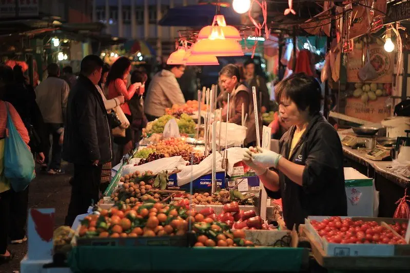 temple street night market fruit stalls by oleg
