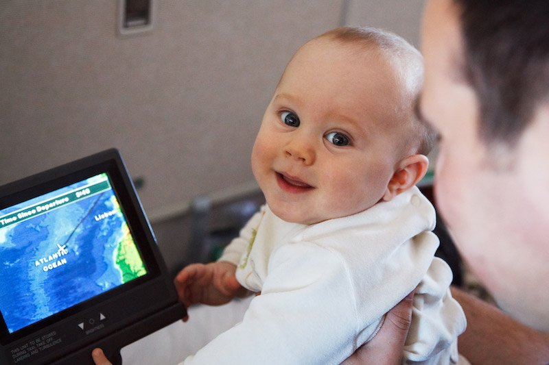 travel toys for toddlers - PB baby with dad on plane pic