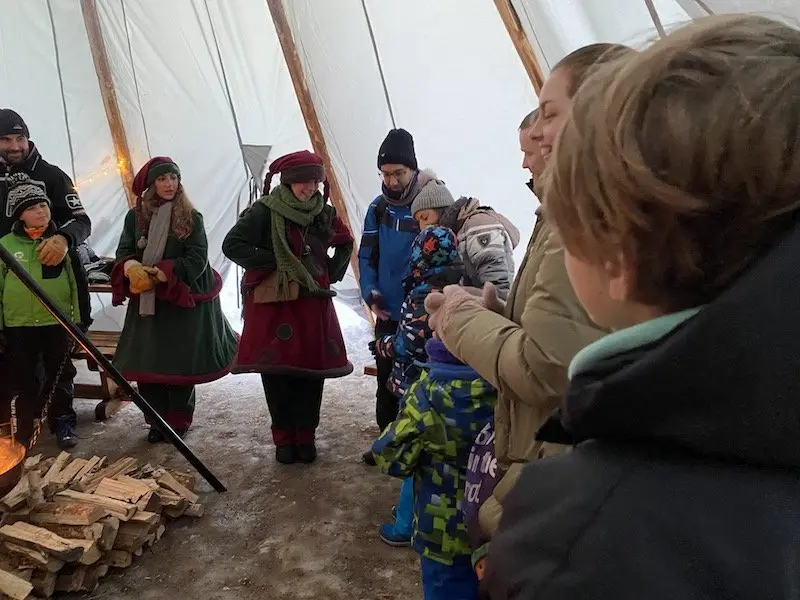 Image - Lapland elves leading the round of song at santa claus secret forest of joulukka