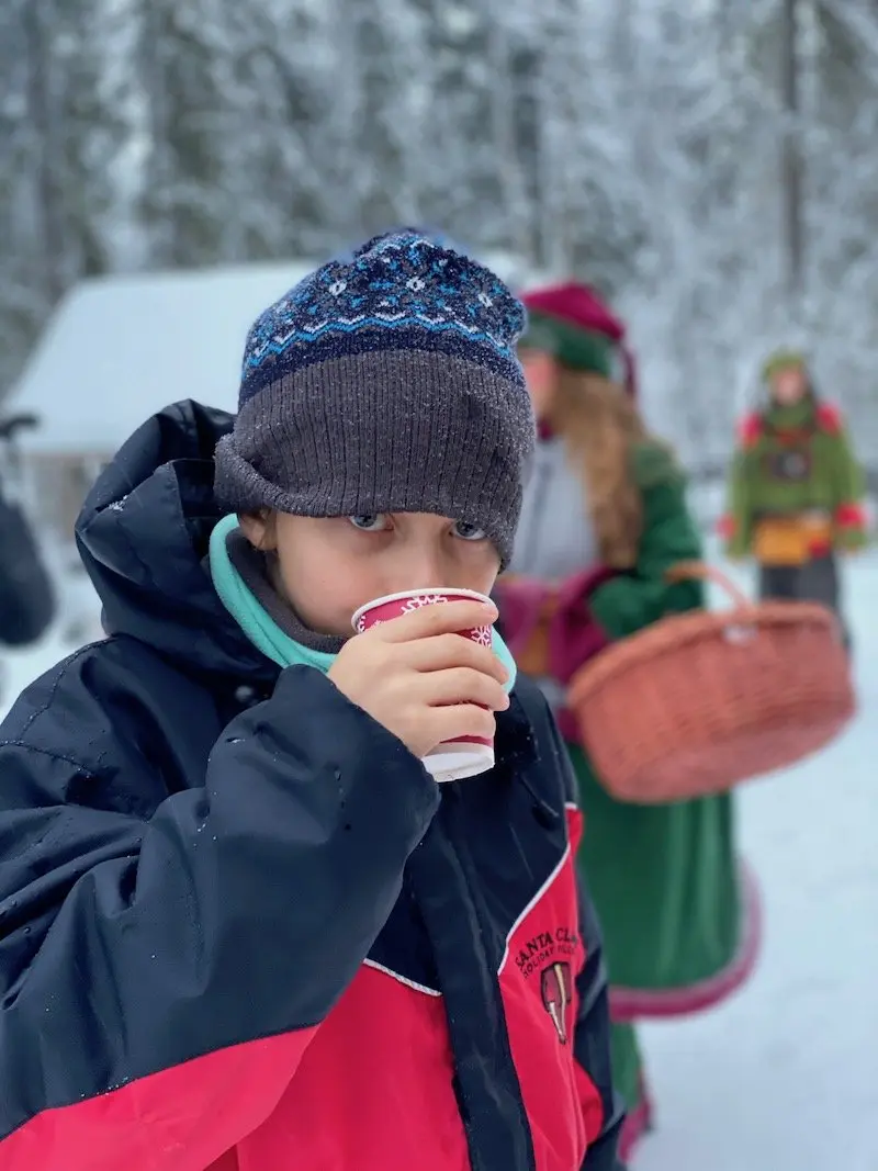 Image - drinking juice at santa claus secret forest of joulukka tour