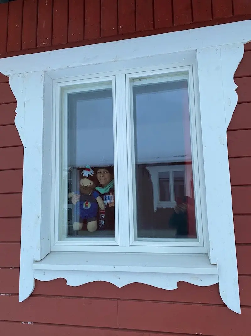 image - ned at window of santa claus holiday village cabin