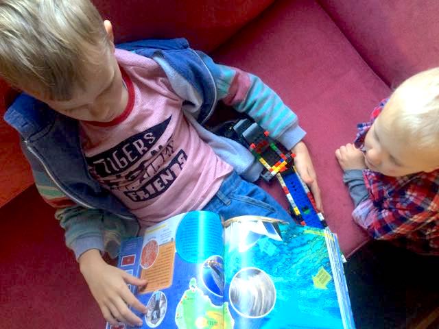 image - ned reading lonely planet travel books for kids