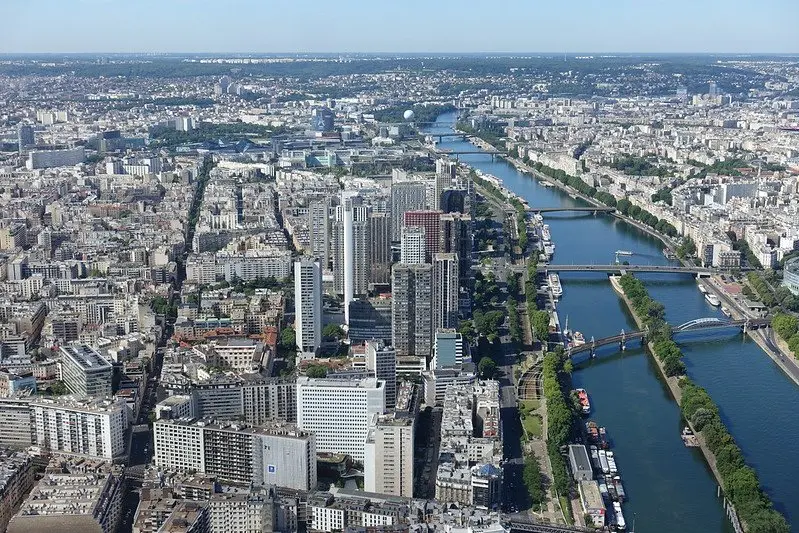 view from the summit of eiffel tower paris by guilhem vellut