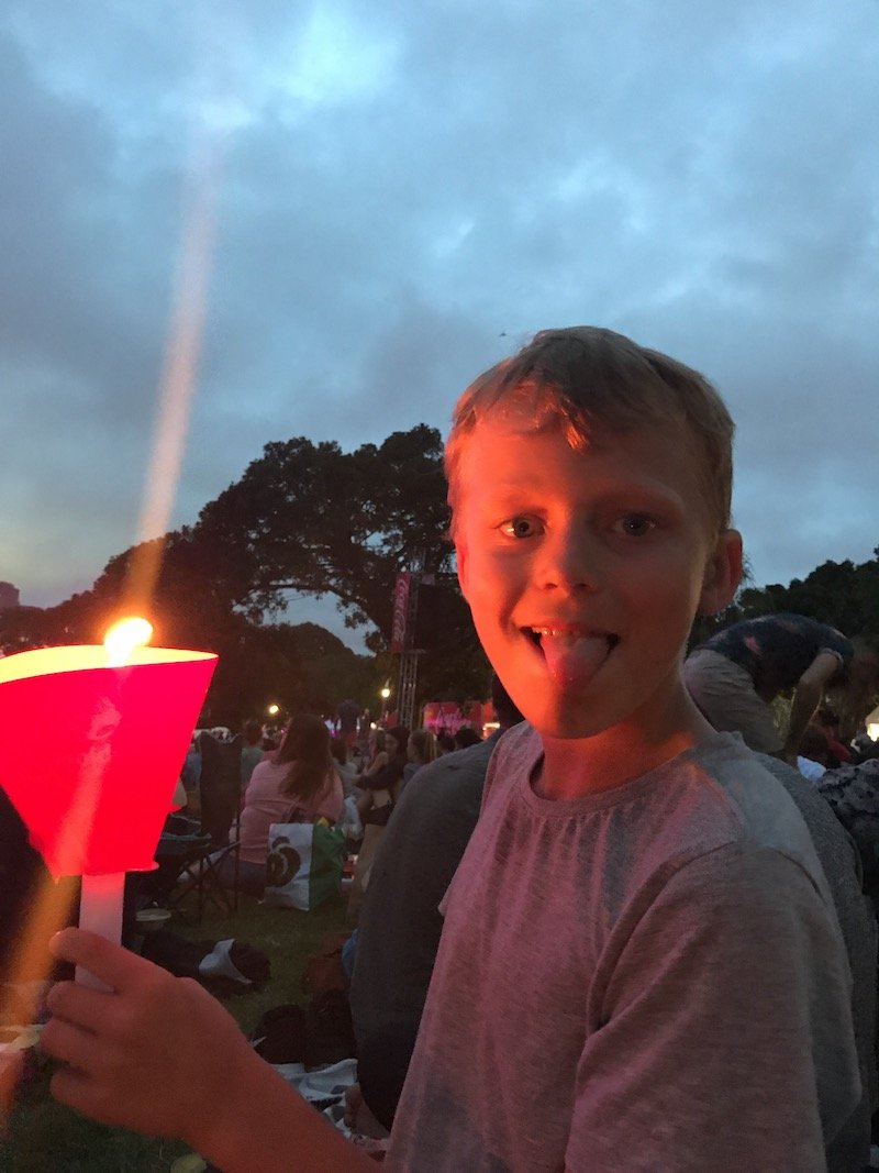 photo - christmas carols in the domain show at night