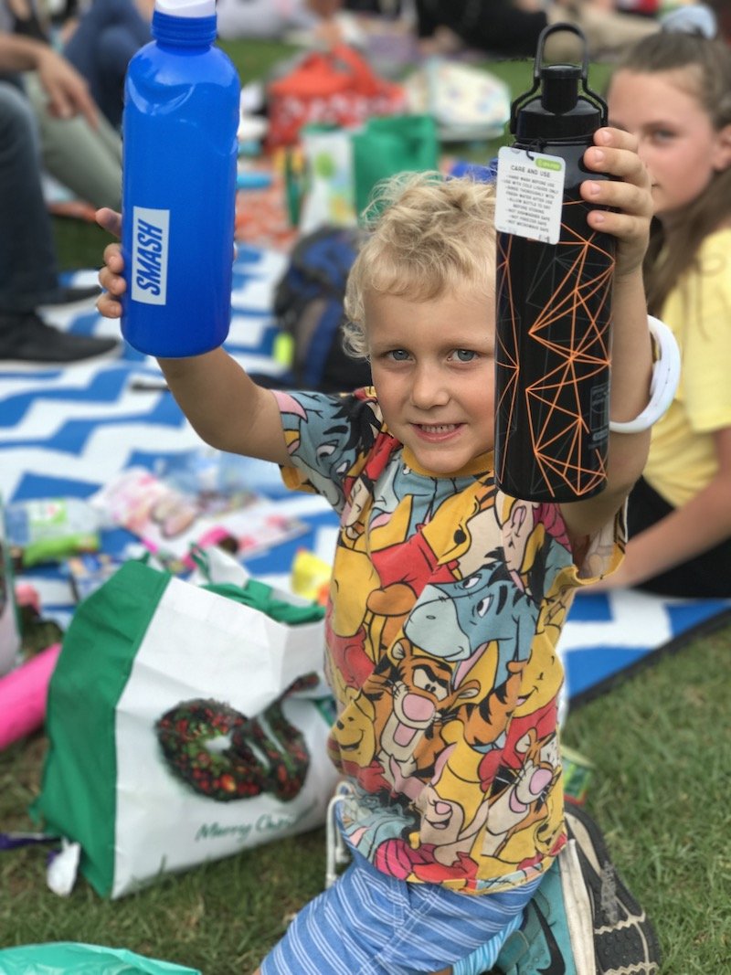 photo - christmas carols in the domain sydney salvation army bag haul