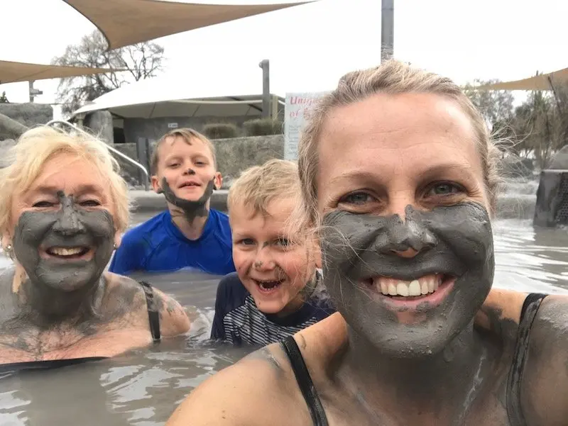 Photo - family at mud spa pools at hells gate rotorua