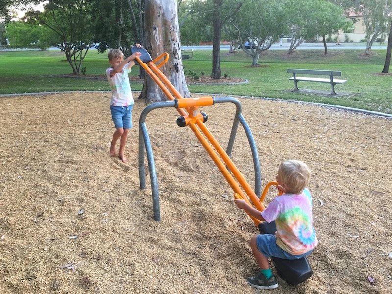 photo - lions playground helensvale seesaw with boys