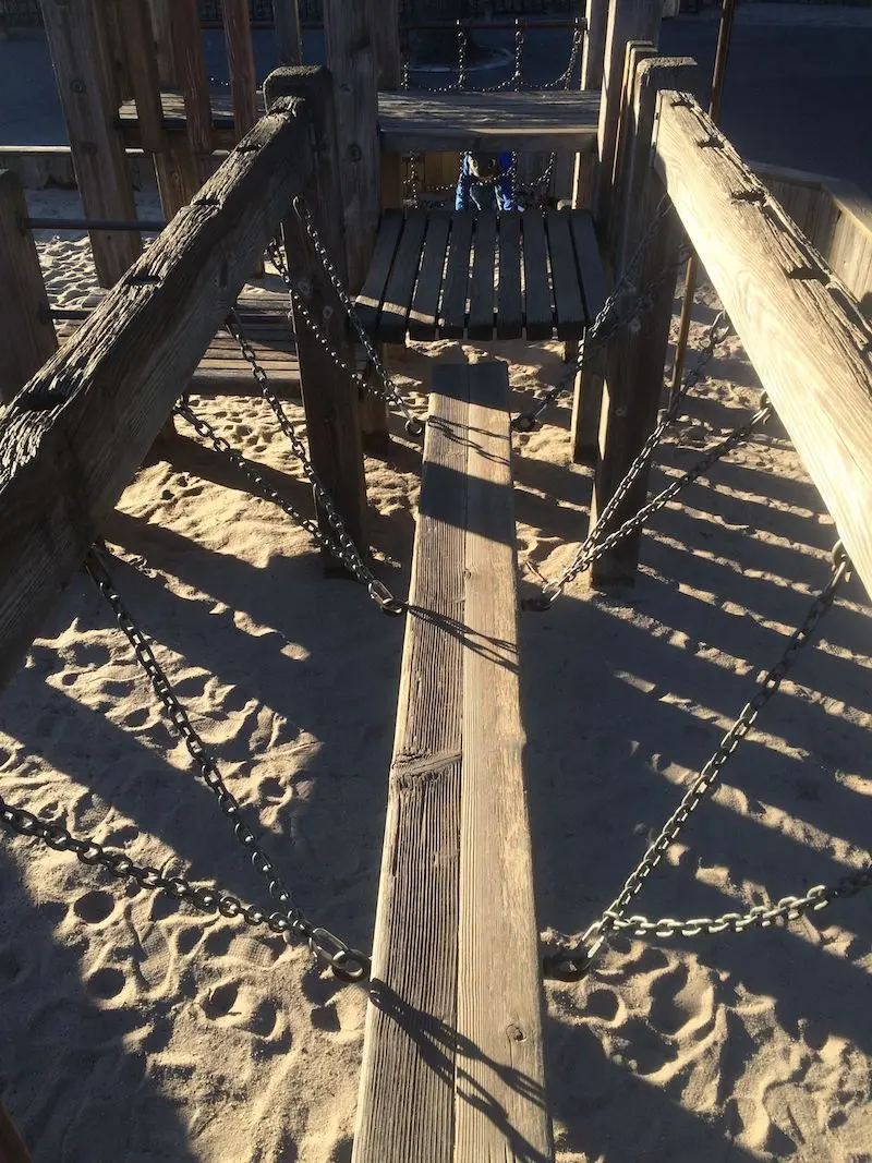 image - diana ross playground log bridge