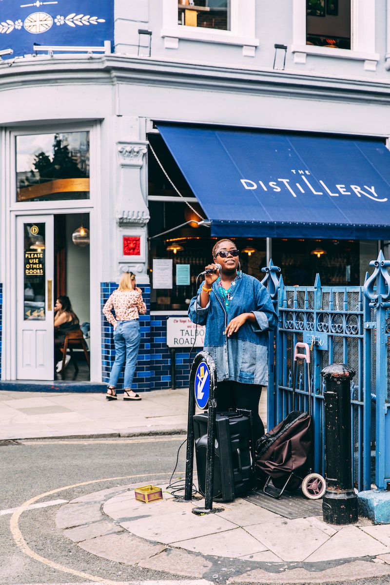 image - portobello market london busker by simon-rae