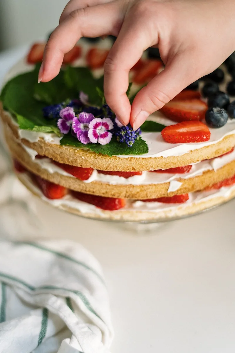 image - edible flowers on cake by pexels-cottonbro