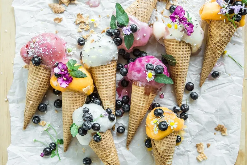 image - edible flowers on ice cream by brooke-lark