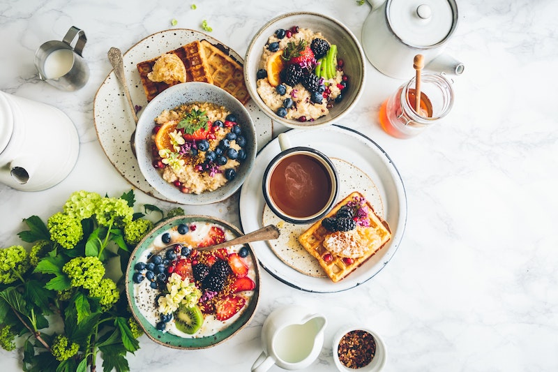 image - edible flowers on porridge oatmeal by brooke-lark