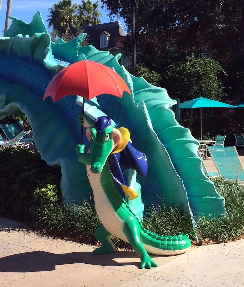 image - disney port orleans resort french quarter swimming pool alligator statue by jared flickr