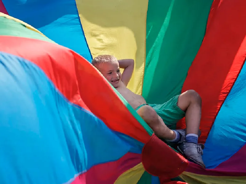 image - parachute play with kids on the trampoline