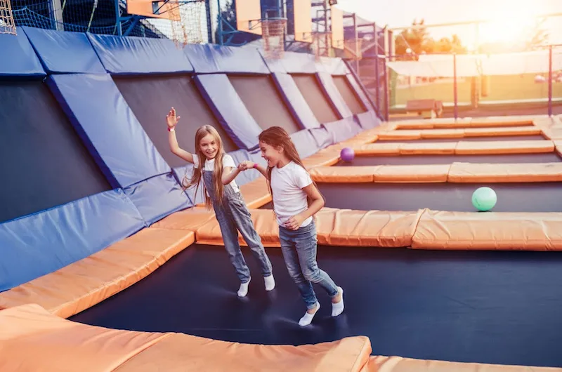 image - trampoline game with balls at park