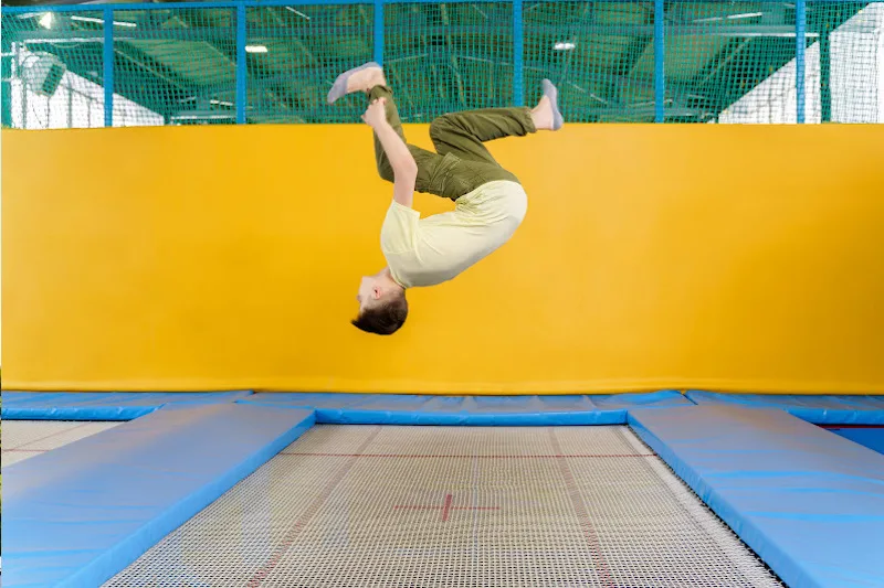 image - trampoline tricks with yellow wall